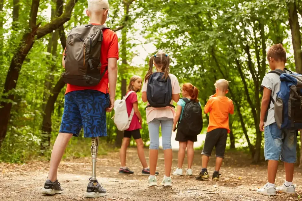 Group of diverse children on a walk in the park